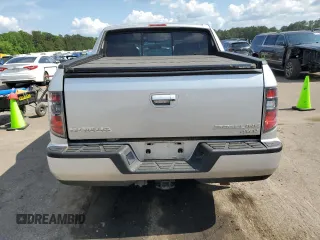 2014 Honda Ridgeline RTL with VIN 5FPYK1F57EB002835, listed as a Copart auction lot 54748905 with 111,253 mi miles and Salvage title. Bid and sale history available at DreamBid. Image 6.