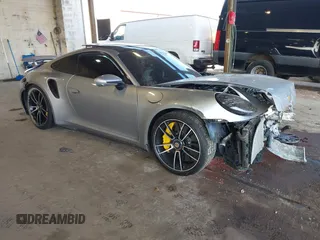 2022 Porsche 911 Turbo S with VIN WP0AD2A95NS255711, listed as a IAAI auction lot 41791455 with 11,206 mi miles and . Bid and sale history available at DreamBid. Image 1.