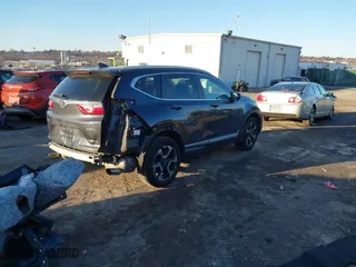 2017 Honda CR-V Touring with VIN 2HKRW2H90HH647274, listed as a IAAI auction lot 41572666 with 95,264 mi miles. Bid and sale history available at carsss.com. Image 4.
