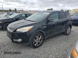 2013 Ford Escape SEL with VIN 1FMCU0H98DUC48866, listed as a Copart auction lot 51103295 with 92,119 mi miles and Salvage Title. Bid and sale history available at carsss.com. Image 1.