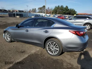 2019 Infiniti Q50 3.0t LUXE with VIN JN1EV7AR0KM593743, listed as a Copart auction lot 83748304 with 70,650 mi miles and Salvage Title. Bid and sale history available at carsss.com. Image 2.
