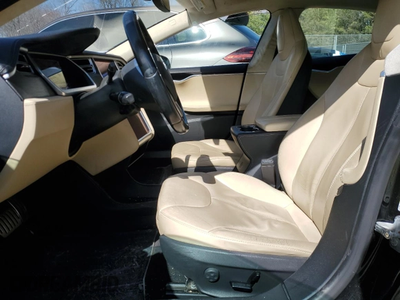 2014 Tesla Model S 60 with VIN 5YJSA1H10EFP34137, listed as a Copart auction lot 47645795 with Not provided miles and Salvage title. Bid and sale history available at DreamBid. Image 7.