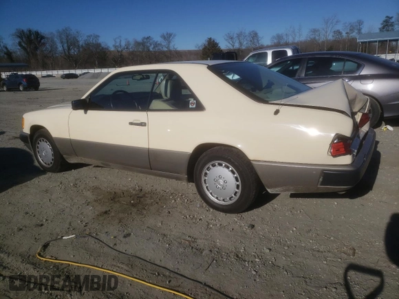 1988 Mercedes-Benz 300 with VIN WDBEA50D9JA698251, listed as a Copart auction lot 46977055 with 107,949 mi miles and Salvage Title. Bid and sale history available at DreamBid. Image 2.