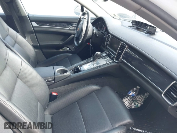 2016 Porsche Panamera 4 z VIN WP0AA2A78GL002029, wystawiony jako IAAI lot #41644555 z przebiegiem 54 915 mil mil oraz . Historia ofert i sprzedaży dostępna na DreamBid. Obrazek 5.