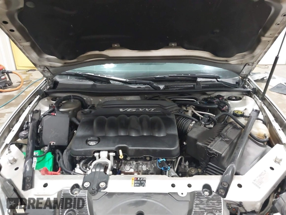 2014 Chevrolet Impala LT with VIN 2G1WB5E37E1178089, listed as a IAAI auction lot 42450127 with 58,277 mi miles and . Bid and sale history available at DreamBid. Image 10.