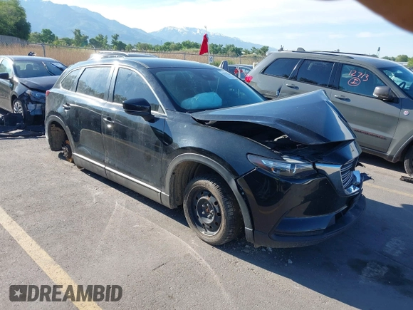 2018 Mazda CX-9 Sport with VIN JM3TCBBY6J0222750, listed as a IAAI auction lot 42294464 with 63,927 mi miles and . Bid and sale history available at DreamBid. Image 1.