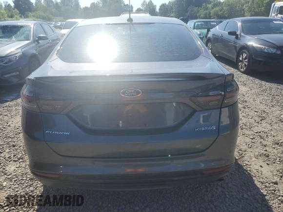 2016 Ford Fusion SE Hybrid z VIN 3FA6P0LU3GR173886, wystawiony jako Copart lot #60066015 z przebiegiem 140 328 mil mil oraz Szkoda całkowita • Salvage title. Historia ofert i sprzedaży dostępna na DreamBid. Obrazek 6.