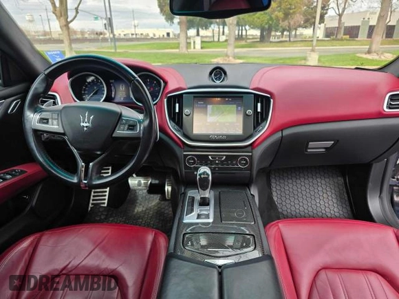 2014 Maserati Ghibli S Q4 z VIN ZAM57RTA7E1089301, wystawiony jako Copart lot #54070585 z przebiegiem 59 787 mil mil oraz Szkoda całkowita • Salvage title. Historia ofert i sprzedaży dostępna na DreamBid. Obrazek 9.
