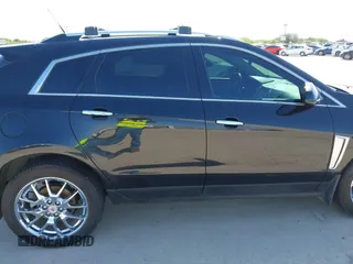 2013 Cadillac SRX Performance Collection with VIN 3GYFNHE35DS548632, listed as a IAAI auction lot 41990670 with 98,659 mi miles. Bid and sale history available at carsss.com. Image 13.