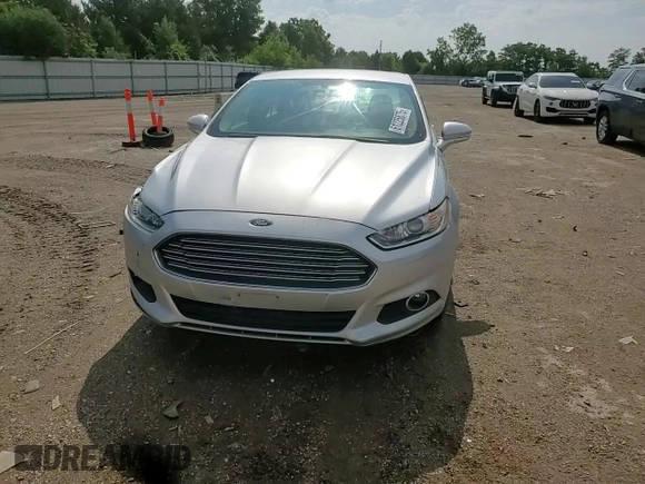 2016 Ford Fusion SE z VIN 3FA6P0HDXGR369218, wystawiony jako Copart lot #61225875 z przebiegiem 176 559 mil mil oraz Szkoda całkowita • Salvage title. Historia ofert i sprzedaży dostępna na DreamBid. Obrazek 13.