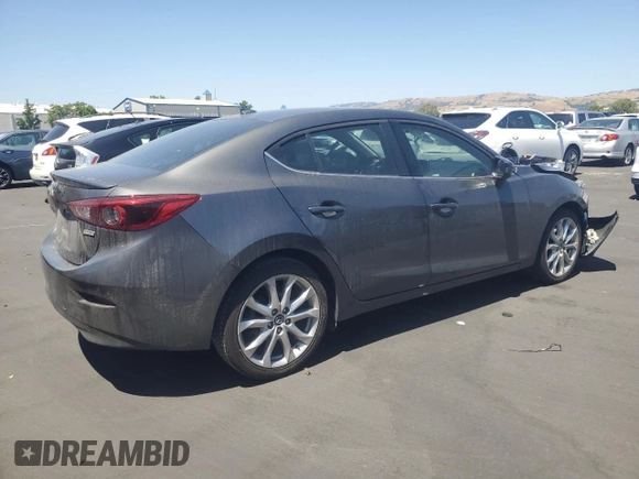 2014 Mazda 3 S Touring with VIN JM1BM1V39E1145478, listed as a Copart auction lot 57860645 with 55,322 mi miles and Salvage title. Bid and sale history available at DreamBid. Image 3.