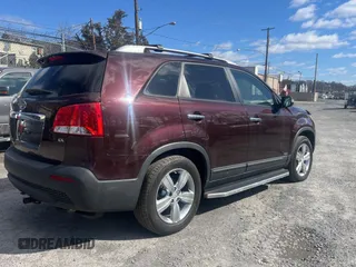 2012 Kia Sorento EX with VIN 5XYKUCA68CG220857, listed as a Copart auction lot 46635505 with 129,151 mi miles and Clean Title. Bid and sale history available at carsss.com. Image 4.