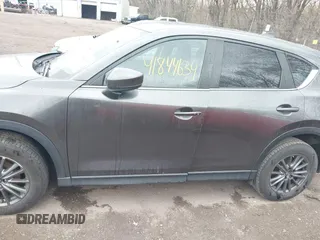 2017 Mazda CX-5 Touring with VIN JM3KFACL3H0148312, listed as a IAAI auction lot 41844634 with 68,534 mi miles and . Bid and sale history available at carsss.com. Image 14.