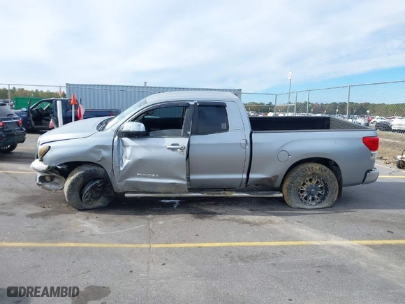 2010 Toyota Tundra 2WD Truck with VIN 5TFRM5F18AX019641, listed as a IAAI auction lot 39478240 with 241,424 mi miles. Bid and sale history available at carsss.com. Image 14.