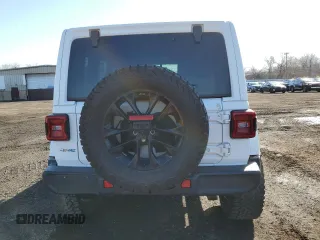 2021 Jeep Wrangler Unlimited Sahara with VIN 1C4JJXP64MW762819, listed as a Copart auction lot 49796845 with 76,543 mi miles and Salvage Title. Bid and sale history available at DreamBid. Image 6.