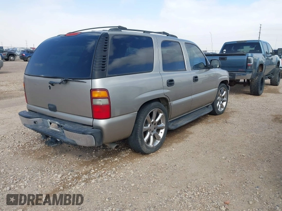 2002 Chevrolet Tahoe LS with VIN 1GNEC13Z02R244573, listed as a IAAI auction lot 41807744 with 245,788 mi miles and . Bid and sale history available at DreamBid. Image 4.