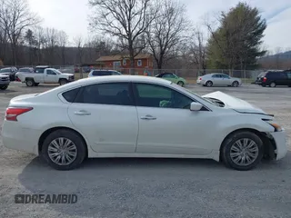 2015 Nissan Altima S with VIN 1N4AL3AP1FN308613, listed as a IAAI auction lot 41398676 with 152,886 mi miles and . Bid and sale history available at DreamBid. Image 14.