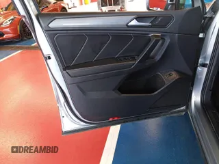 2024 Volkswagen Tiguan SE z VIN 3VV3B7AX7RM105271, wystawiony jako IAAI lot #42752403 z przebiegiem 27 050 mil mil oraz . Historia ofert i sprzedaży dostępna na DreamBid. Obrazek 32.