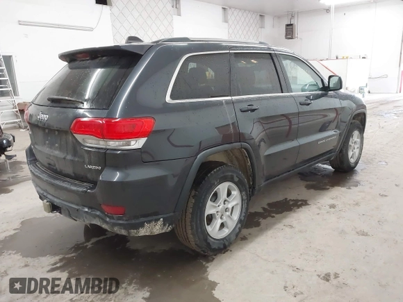2014 Jeep Grand Cherokee Laredo with VIN 1C4RJFAG4EC186926, listed as a IAAI auction lot 41745168 with 128,519 mi miles. Bid and sale history available at carsss.com. Image 4.