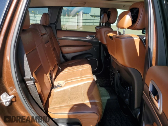 2015 Jeep Grand Cherokee Summit с VIN 1C4RJFJG9FC914516, выставлен на аукционе Copart как лот 57410505 с пробегом 130 350 миль миль и Списание • Salvage title. История ставок и продаж доступна на DreamBid. Изображение 10.