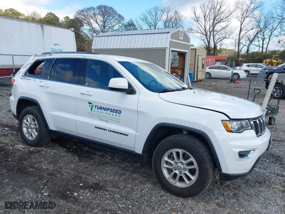 2018 Jeep Grand Cherokee Laredo E with VIN 1C4RJFAG8JC424609, listed as a IAAI auction lot 41124689 with 101,643 mi miles. Bid and sale history available at carsss.com. Image 1.