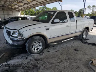 1998 Ford F-150 XL with VIN 1FTRX17L8WNA36541, listed as a Copart auction lot 70861344 with 266,137 mi miles and Salvage title. Bid and sale history available at DreamBid. Image 1.