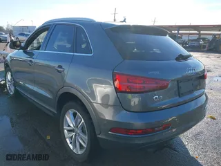 2016 Audi Q3 Premium Plus with VIN WA1BFCFSXGR014778, listed as a IAAI auction lot 41285863 with 73,044 mi miles. Bid and sale history available at carsss.com. Image 3.
