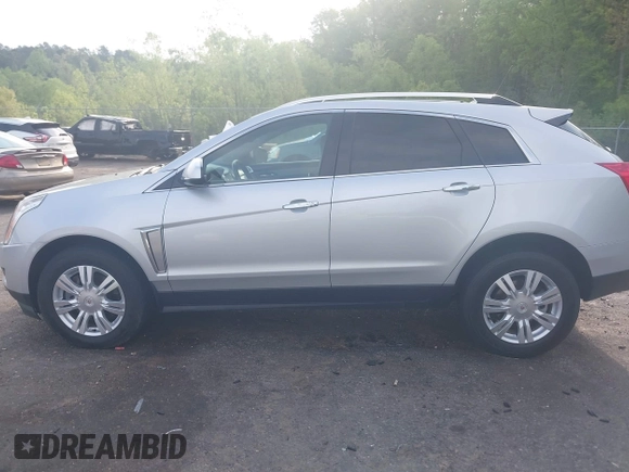 2015 Cadillac SRX Luxury Collection with VIN 3GYFNBE3XFS612048, listed as a IAAI auction lot 41923525 with 154,621 mi miles. Bid and sale history available at carsss.com. Image 14.