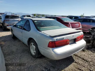 1997 Ford Thunderbird LX z VIN 1FALP62W2VH171912, wystawiony jako Copart lot #65073454 z przebiegiem 179 439 mil mil oraz Szkoda całkowita • Salvage title. Historia ofert i sprzedaży dostępna na DreamBid. Obrazek 2.