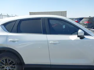 2017 Mazda CX-5 Sport with VIN JM3KFABL5H0124725, listed as a IAAI auction lot 40487298 with 103,889 mi miles. Bid and sale history available at carsss.com. Image 13.