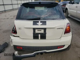 2007 MINI Hardtop S with VIN WMWMF735X7TL83242, listed as a Copart auction lot 41609565 with 83,320 mi miles and Salvage Title. Bid and sale history available at DreamBid. Image 6.