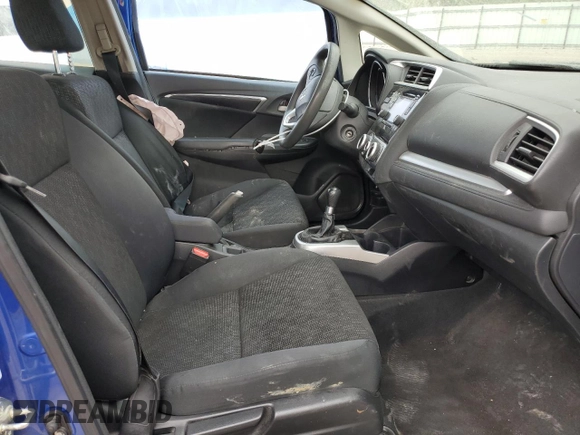 2015 Honda Fit LX with VIN 3HGGK5G51FM718512, listed as a Copart auction lot 52790065 with 111,667 mi miles and Salvage title. Bid and sale history available at DreamBid. Image 7.