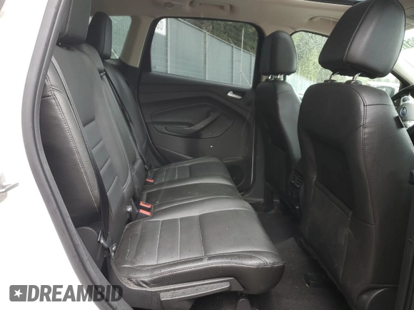 2015 Ford Escape Titanium с VIN 1FMCU9J98FUB31984, выставлен на аукционе Copart как лот 57406115 с пробегом 116 681 миль миль и Чистый • Clean title. История ставок и продаж доступна на DreamBid. Изображение 11.