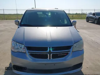 2014 Dodge Grand Caravan SXT z VIN 2C4RDGCG4ER244762, wystawiony jako IAAI lot #42002269 z przebiegiem 117 896 mil mil oraz . Historia ofert i sprzedaży dostępna na DreamBid. Obrazek 6.