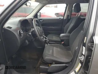 2014 Jeep Patriot Altitude with VIN 1C4NJPBAXED595327, listed as a Copart auction lot 53665005 with 134,771 mi miles and Salvage Title. Bid and sale history available at DreamBid. Image 7.