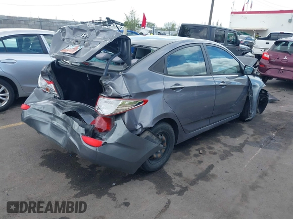 2015 Hyundai Accent GLS with VIN KMHCT4AE8FU825898, listed as a IAAI auction lot 42066640 with 79,593 mi miles and . Bid and sale history available at DreamBid. Image 4.