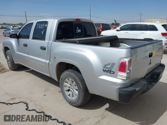 2006 Mitsubishi Raider LS z VIN 1Z7HT28KX6S576515, wystawiony jako IAAI lot #42180535 z przebiegiem 169 922 mil mil oraz . Historia ofert i sprzedaży dostępna na DreamBid. Obrazek 3.