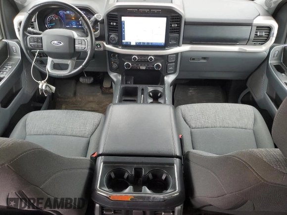 2021 Ford F-150 XL with VIN 1FTFW1E51MKE79591, listed as a Copart auction lot 48353305 with 104,627 mi miles and Salvage Title. Bid and sale history available at carsss.com. Image 8.