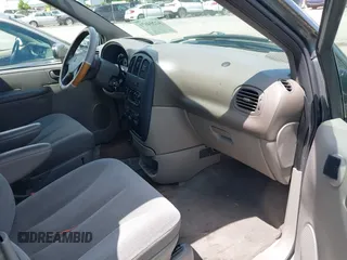 2003 Dodge Caravan SE with VIN 1D4GP24343B308925, listed as a IAAI auction lot 42204671 with 166,875 mi miles and . Bid and sale history available at carsss.com. Image 5.