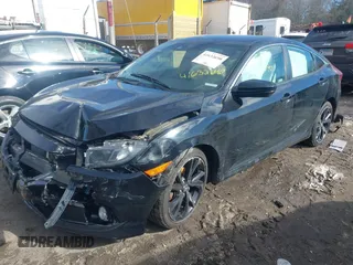2019 Honda Civic Sport with VIN 2HGFC2F86KH515658, listed as a IAAI auction lot 41632690 with 109,866 mi miles and . Bid and sale history available at DreamBid. Image 2.