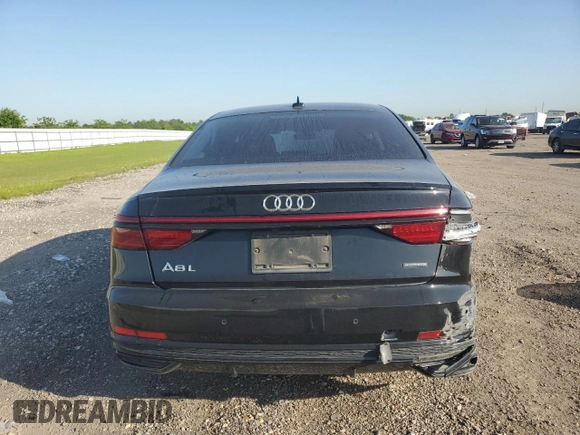 2021 Audi A8 z VIN WAU8DAF82MN007466, wystawiony jako Copart lot #52255715 z przebiegiem Nie podano mil oraz Szkoda całkowita • Salvage title. Historia ofert i sprzedaży dostępna na DreamBid. Obrazek 6.