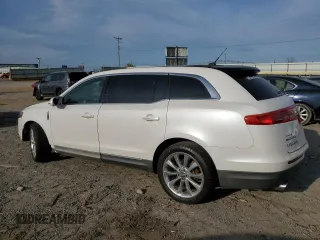 2012 Lincoln MKT EcoBoost with VIN 2LMHJ5AT7CBL50296, listed as a Copart auction lot 53883455 with 127,296 mi miles and Clean Title. Bid and sale history available at DreamBid. Image 2.