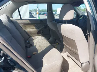 1997 Honda Civic LX with VIN JHMEJ6678VS032473, listed as a IAAI auction lot 42110249 with 257,328 mi miles. Bid and sale history available at carsss.com. Image 8.
