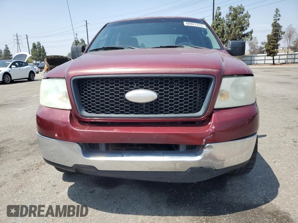 2005 Ford F-150 XLT with VIN 1FTPW125X5KF09293, listed as a Copart auction lot 60921515 with 154,521 mi miles and Salvage title. Bid and sale history available at DreamBid. Image 5.