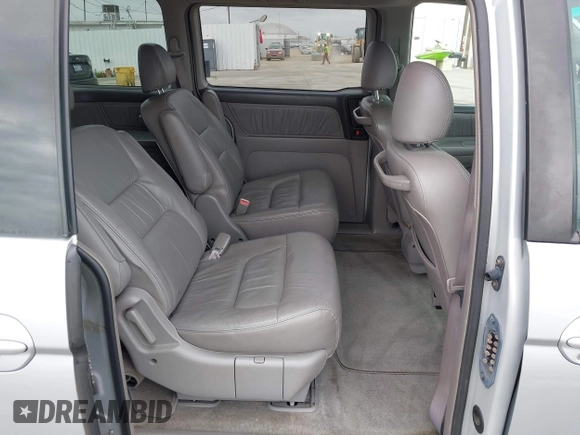 2003 Honda Odyssey EX-L with VIN 5FNRL18943B030373, listed as a IAAI auction lot 41867289 with 179,718 mi miles and . Bid and sale history available at DreamBid. Image 8.