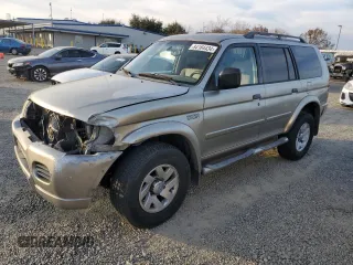 2003 Mitsubishi Montero Sport XLS with VIN JA4MT31R63J004571, listed as a Copart auction lot 84184434 with 187,018 mi miles and Salvage Title. Bid and sale history available at carsss.com. Image 1.