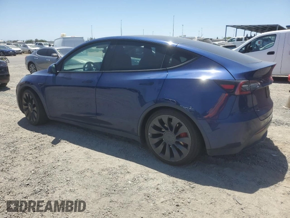 2022 Tesla Model Y Performance z VIN 7SAYGDEF6NF337710, wystawiony jako Copart lot #60200985 z przebiegiem 101 168 mil mil oraz Szkoda całkowita • Salvage title. Historia ofert i sprzedaży dostępna na DreamBid. Obrazek 2.