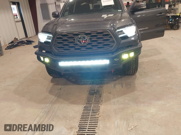 2023 Toyota Tacoma SR с VIN 3TYCZ5AN0PT178013, выставлен на аукционе IAAI как лот 42180865 с пробегом 19 355 миль миль и . История ставок и продаж доступна на DreamBid. Изображение 19.