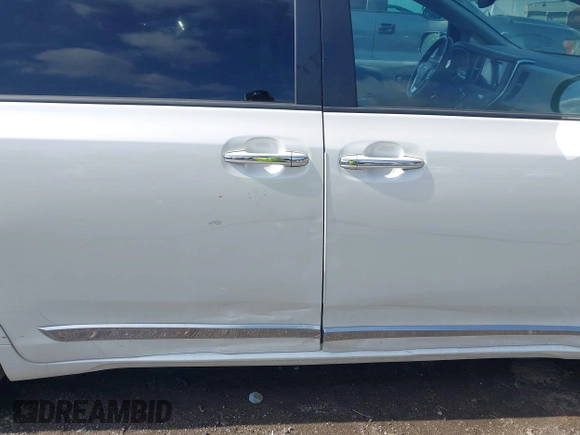 2016 Toyota Sienna XLE with VIN 5TDYK3DC4GS748888, listed as a IAAI auction lot 42605968 with 164,811 mi miles and . Bid and sale history available at DreamBid. Image 18.