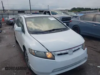 2009 Honda Civic EX-L z VIN 2HGFA16969H354814, wystawiony jako IAAI lot #42080901 z przebiegiem 156 176 mil mil oraz . Historia ofert i sprzedaży dostępna na DreamBid. Obrazek 1.